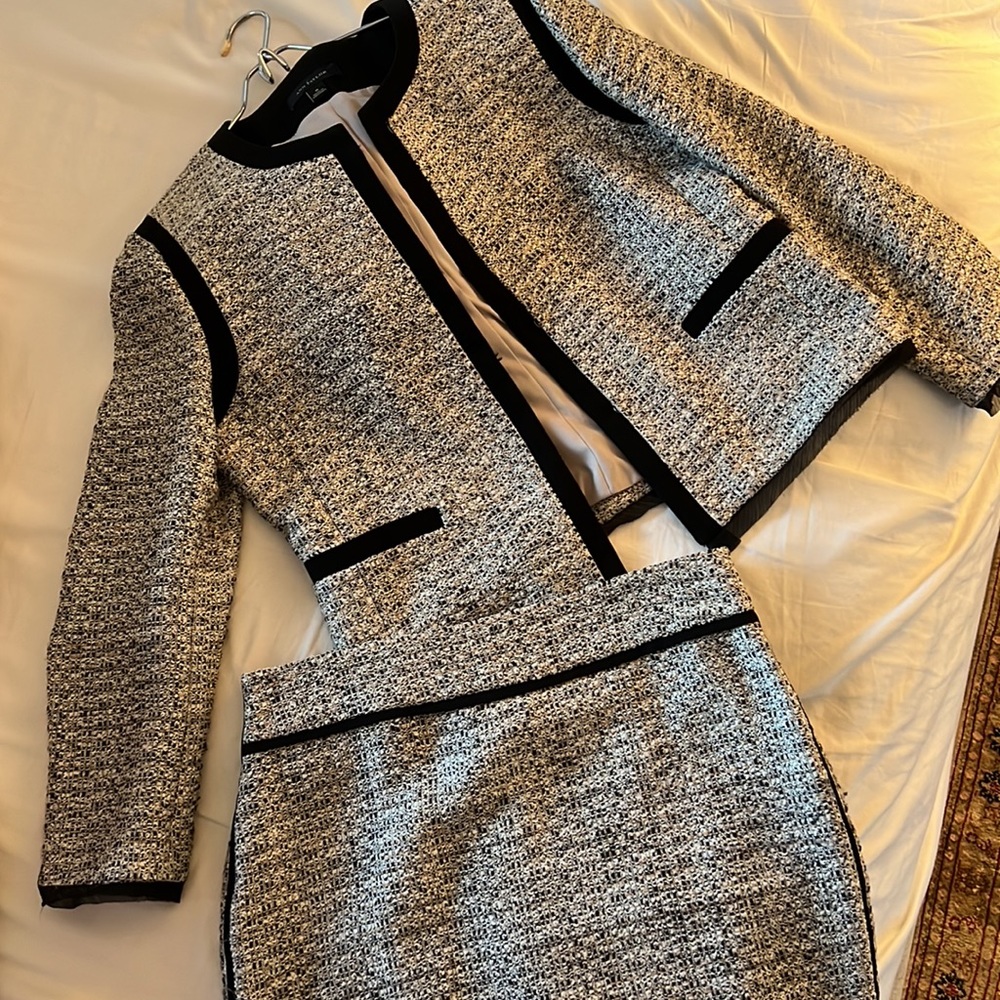 Like new suit with lots of details